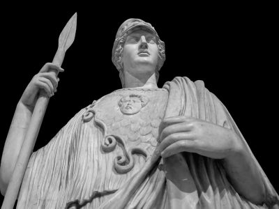 Ancient Greek Roman statue of goddess Athena god of wisdom and the arts historical sculpture isolated on black. Marble woman in helmet sculpture